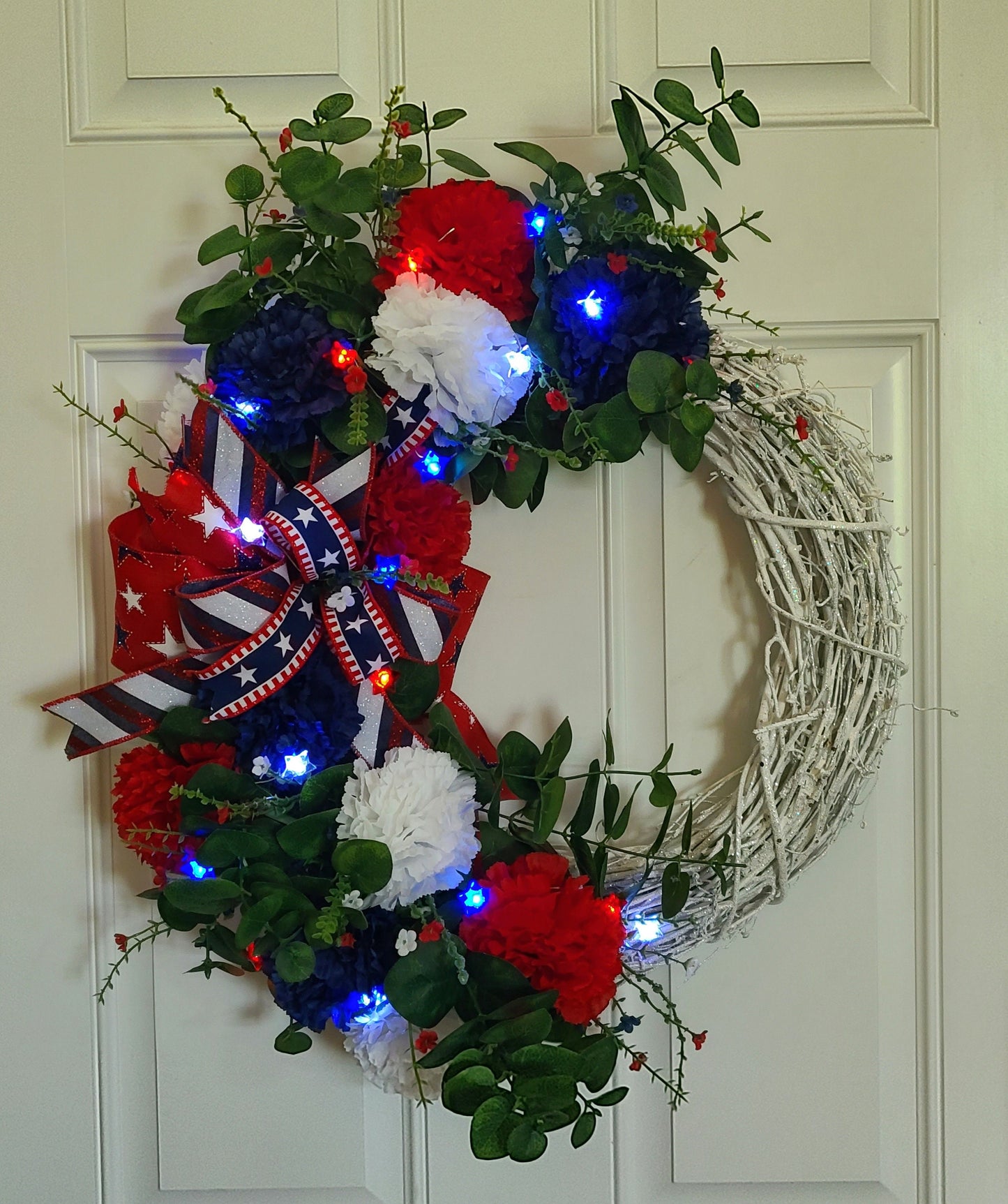 Patriotic Summer White Glitter Grapevine Wreath, Star Battery Powered Lights, Red, White & Blue Carnations Wreath, Fourth of July Wreath